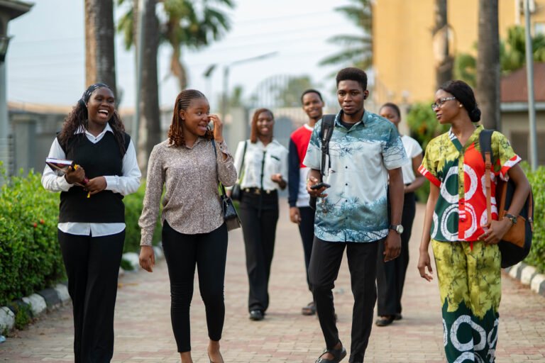 Shanahan University students walking together along the campus walkway