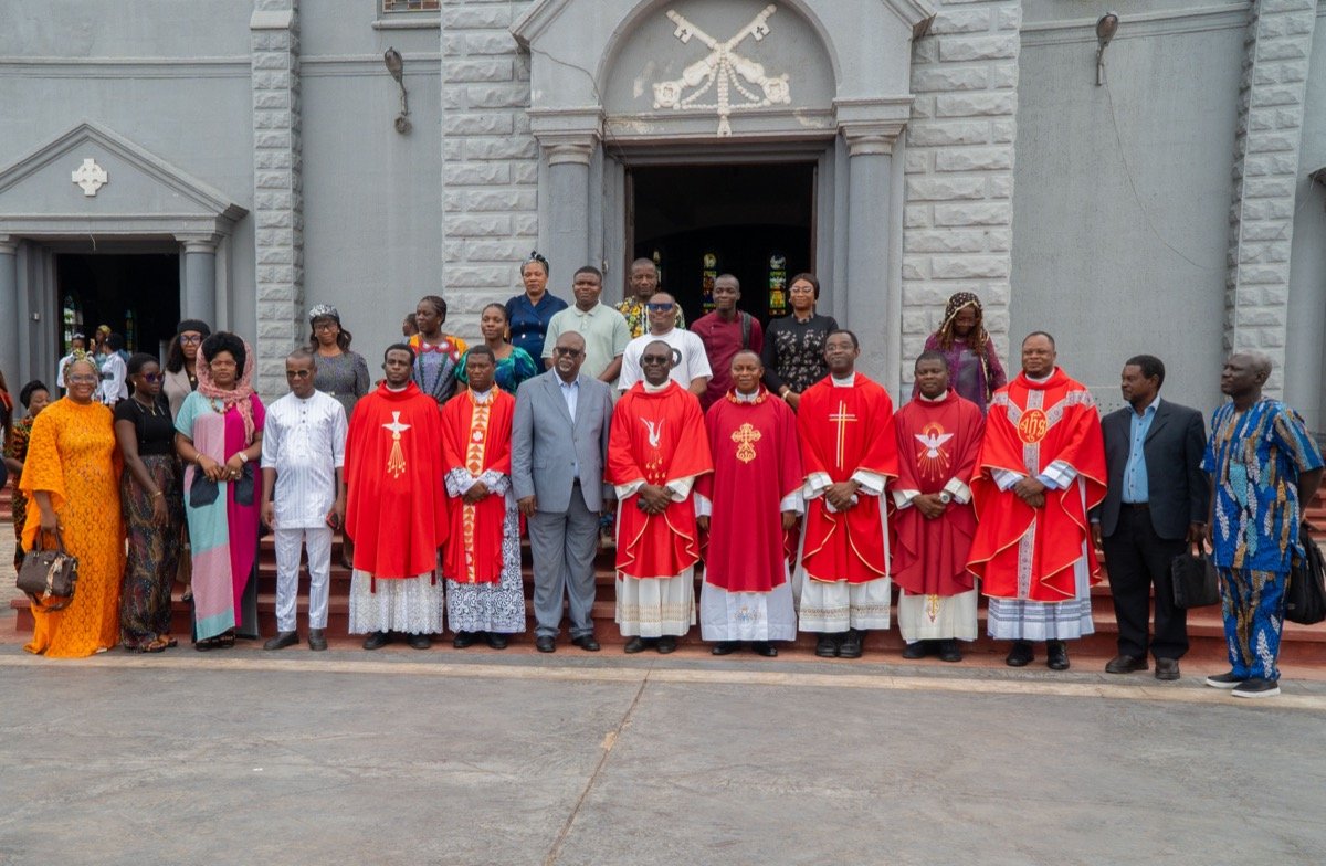 The Acting Vice-Chancellor and staff after the inaugural Mass