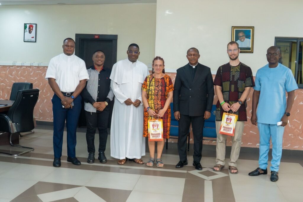 Dr. Réka Fodor and Dr. Márton Háznagy Benedek with priests and university staff at the reception
